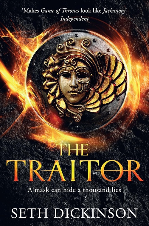 Book cover for The Traitor. An image of a masquerade-style mask on a shield or coin is wreathed in fire.. Text: 'Makes Game of Thrones look like Jackanory - Independent' 'The Traitor' 'A mask can hide a thousand lies' 'Seth Dickinson'
